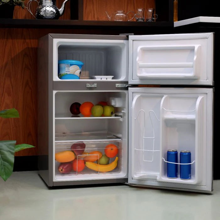 Geepas GRF1259GPE 84L Double Door Defrost Refrigerator – Rapid Cooling | Tempered Glass Shelves | CFC-Free